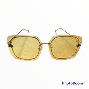 Gorgeous inspired sunglasses with Bee motif. gold lenses... very stylish